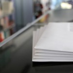 Stack of letters printed with a digital post room (hybrid mailing system).