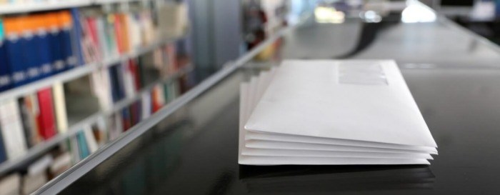 Stack of letters printed with a digital post room (hybrid mailing system).