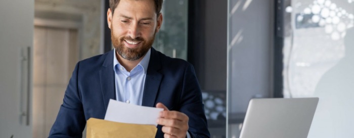 businessman receiving his mail via EasyPost Hybrid Mail