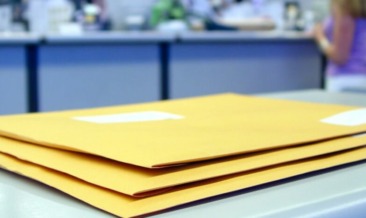 Stack of envelopes ready for transactional mail delivery